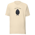 Calcium Iron Attitude t-shirt with a black sesame seed character flexing, heather natural